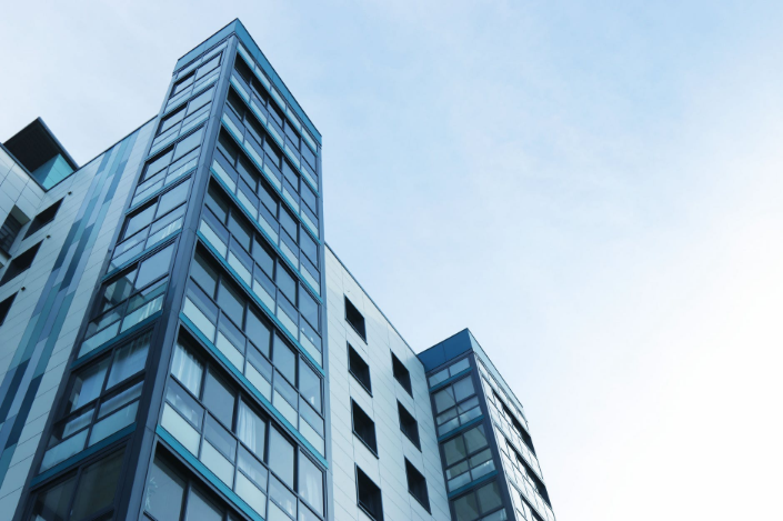 a low-angle shot of a tall building